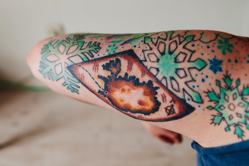 Free Image of Creative tattoo design featuring nature and geometry 