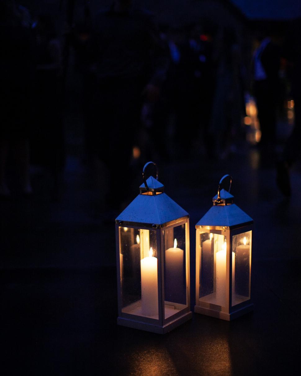 Free Image of Lanterns illuminating a gathering at dusk in a festive atmosphere 