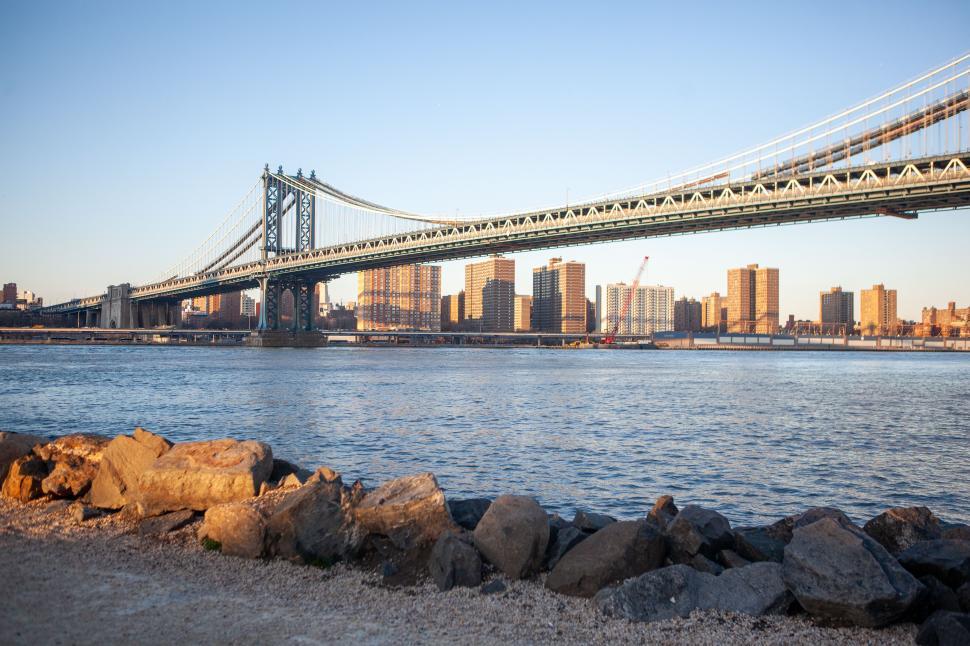 Free Image of View of Manhattan Bridge over East River at sunset in New York City 