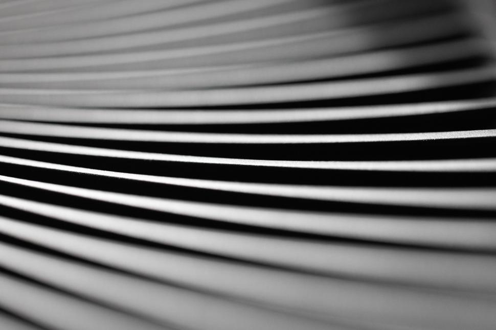 Free Image of Patterns of lines create depth in a close-up view of textured surface 