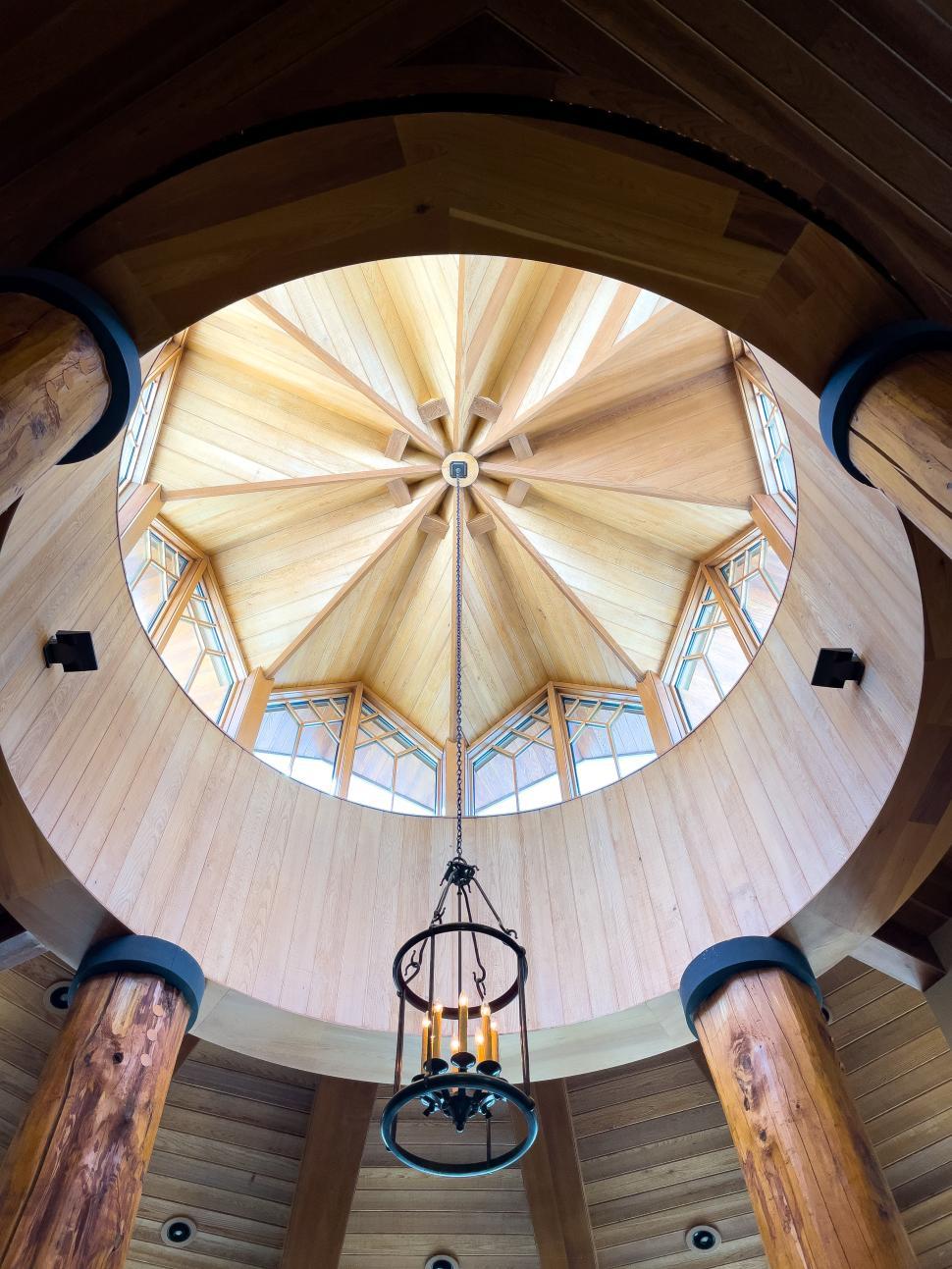 Free Image of Unique architectural design of a wooden ceiling with a dome shape 