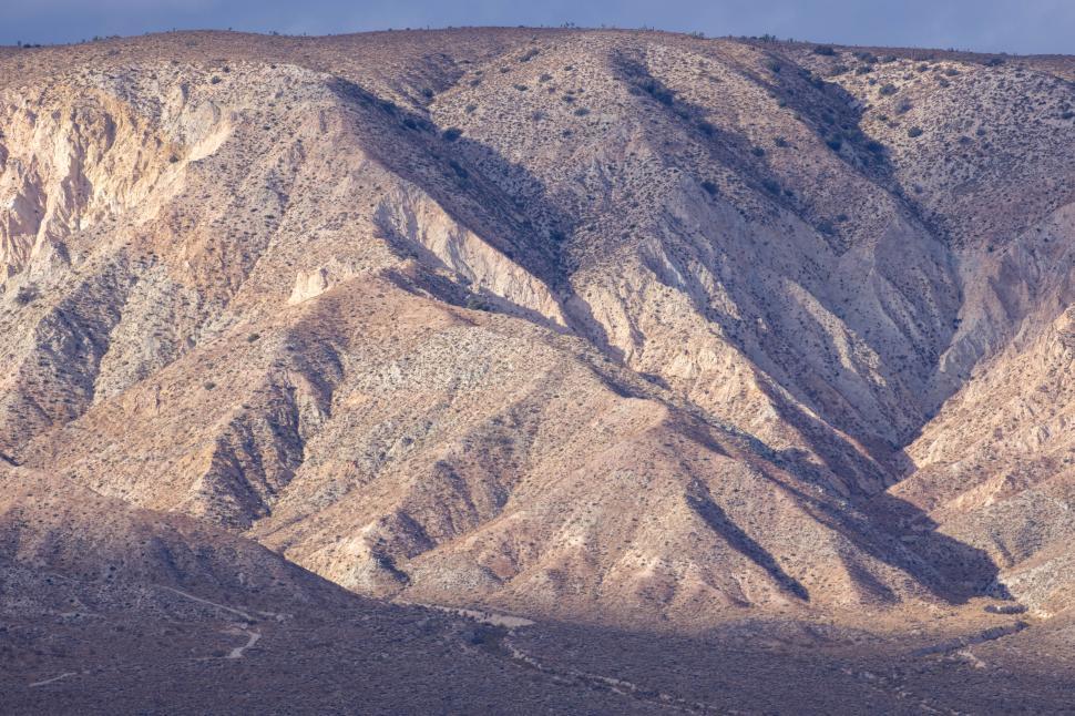 Free Image of Desert mountain range showing rugged terrain and natural beauty 