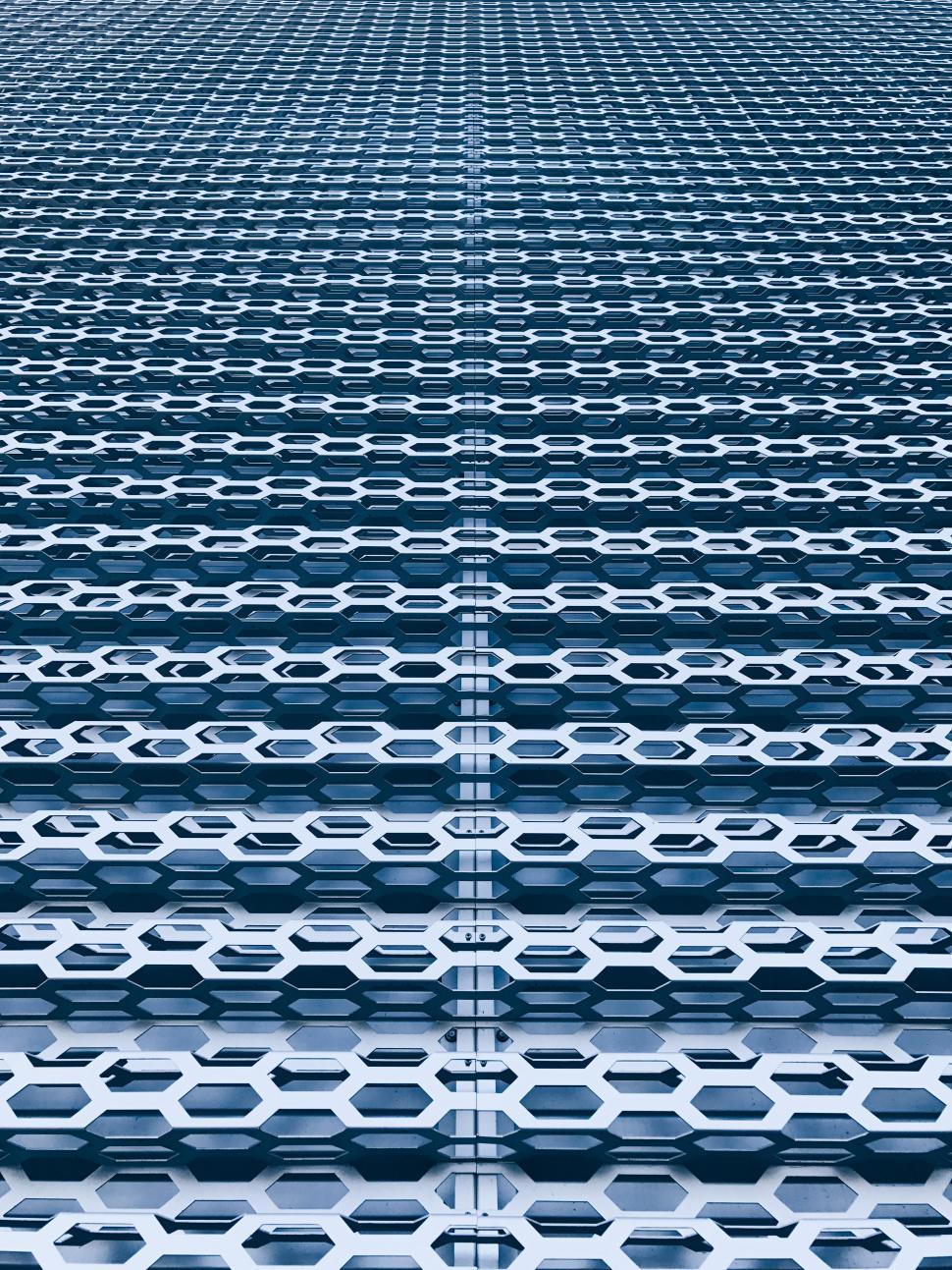 Free Image of Complex geometric pattern in a modern architectural design 