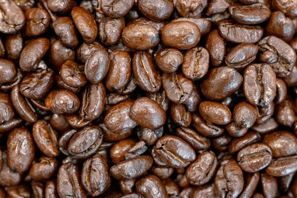 Free Image of Coffee beans ready for roasting in a cozy caf setting 
