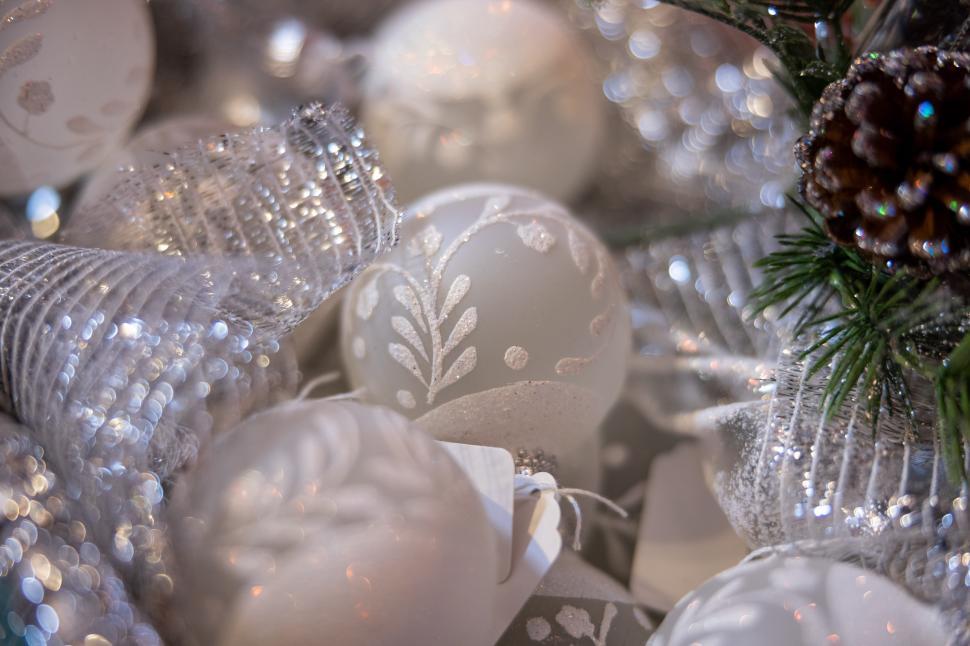 Free Image of Elegant glass ornaments and ribbons for winter decor 
