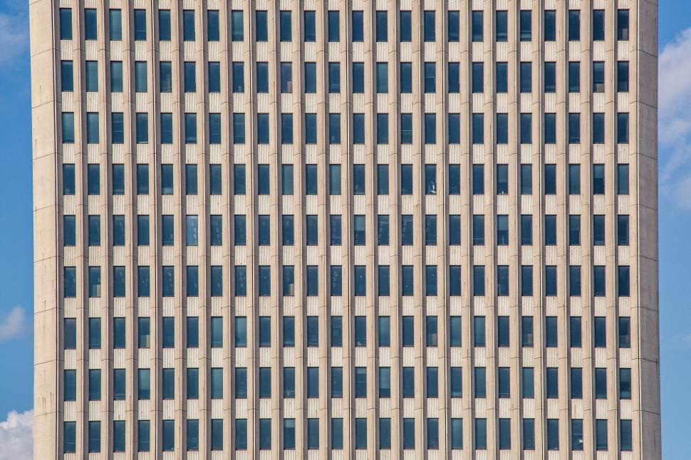 Free Image of Modern office building facade with grid pattern 