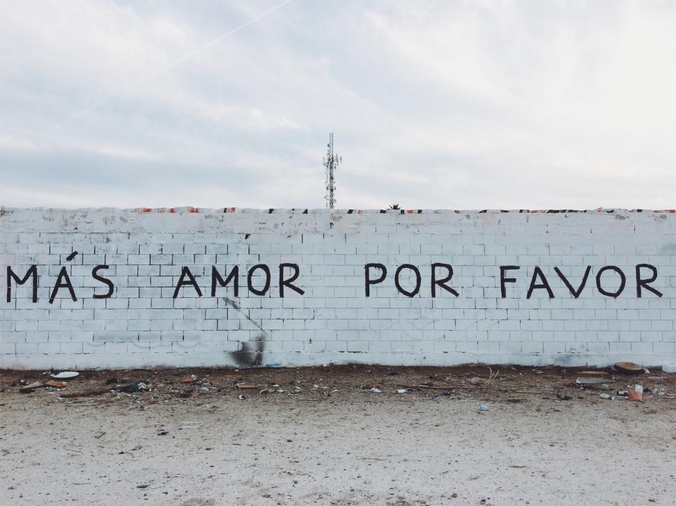 Free Image of Message for love displayed on a wall in an urban area 