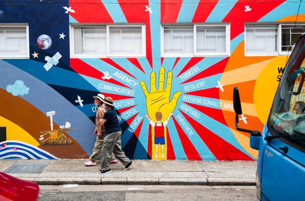 Free Image of Vibrant mural showcases community values in urban setting 