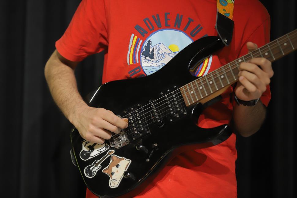 Free Image of Lead guitar performance by Mortaz Band at Sazineh Music Academy in Karaj.  