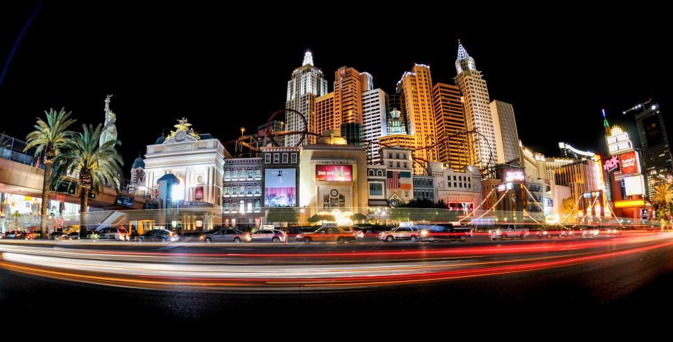 Free Image of Panoramic night view of New York New York Hotel along Las Vegas Strip showcasing vibrant city life and bright lights 