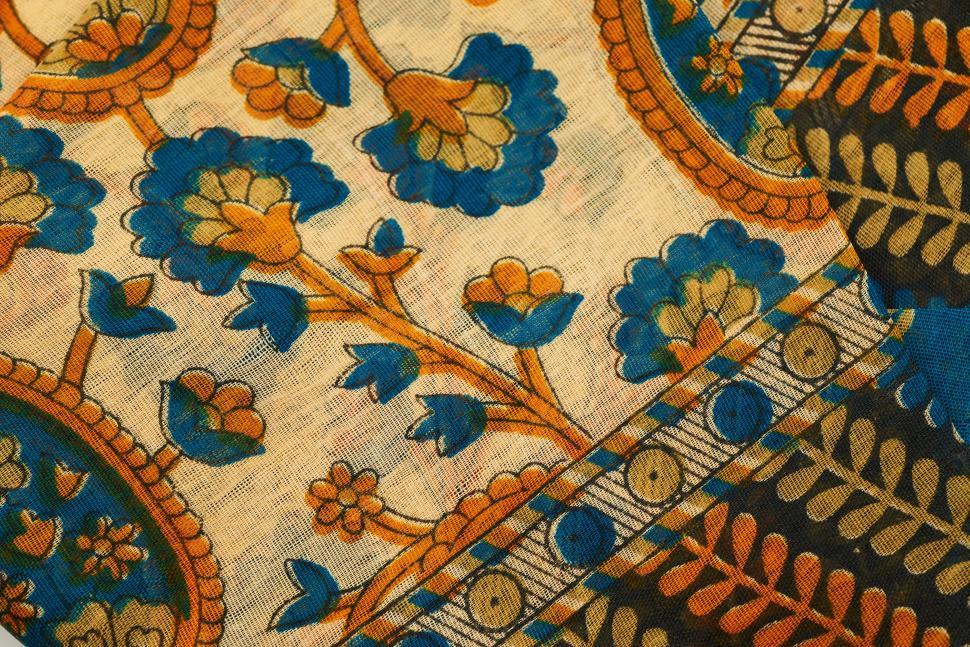Free Image of Handcrafted textile featuring a vibrant, intricate floral pattern 