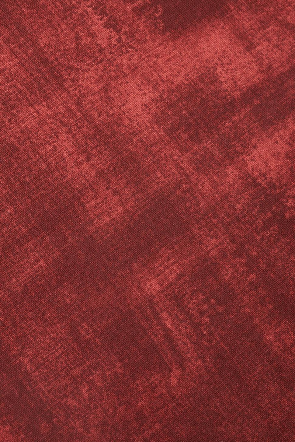 Free Image of Textured red fabric surface with subtle patterns and rich hues 