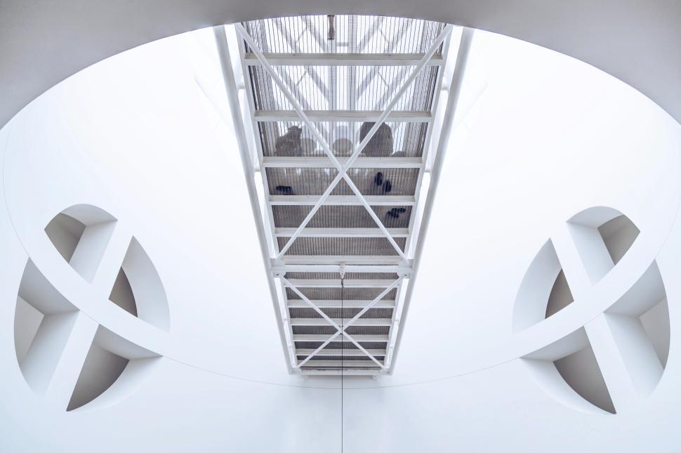 Free Image of Unique architectural design featuring a minimalist interior view 