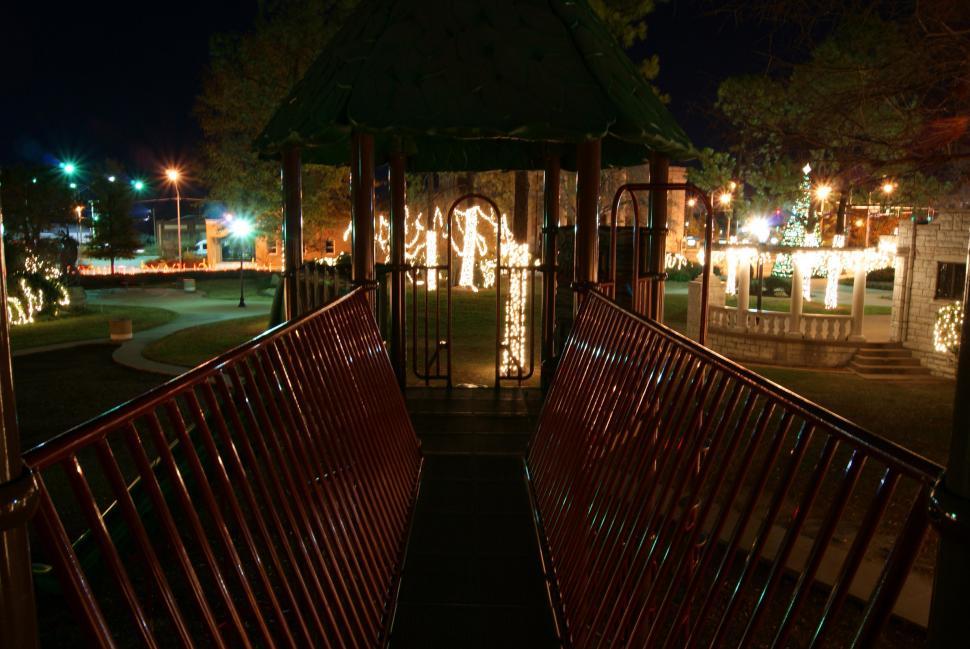 Free Image of Red Bench Under Lit Gazebo 