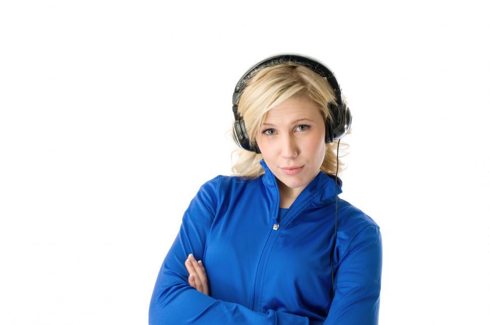 Free Image of Womans in headphones looks a camera 