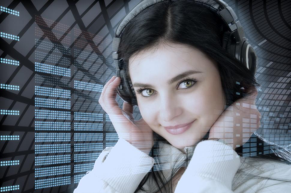 Free Image of Girl listens to music 