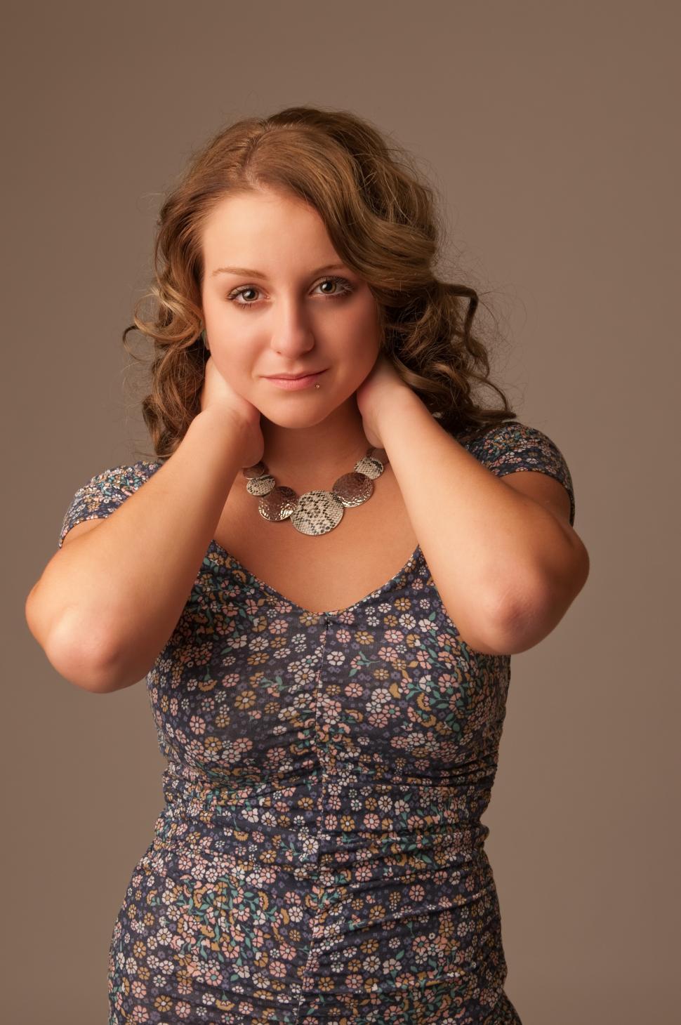 Free Image of Woman in floral dress 
