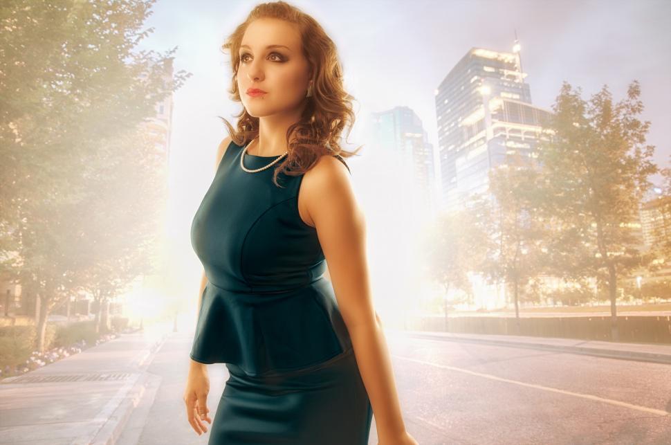 Free Image of Styleized shot of woman in city 