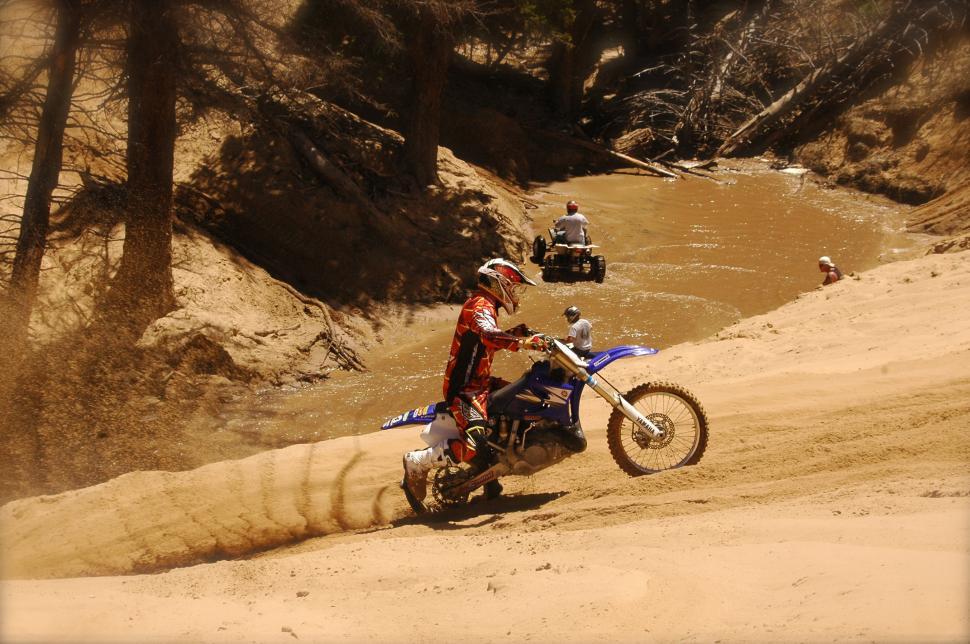 Free Stock Photo of Motorcycle Hill Climbs the Sand Dunes | Download