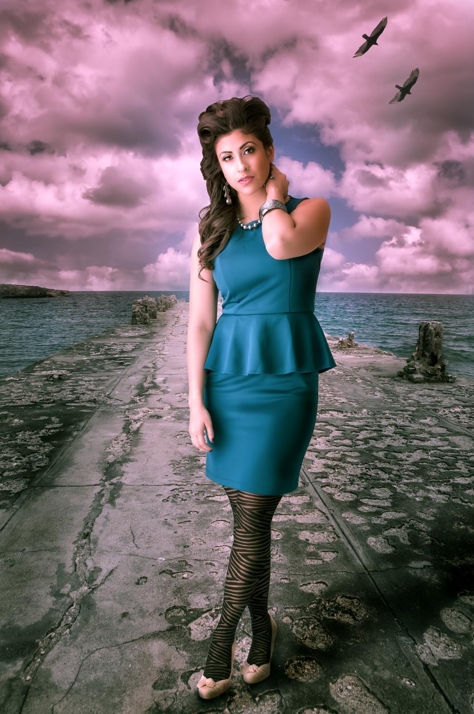 Free Image of Brunette in blue dress 