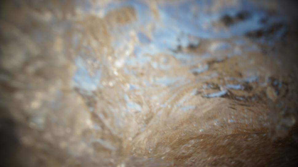 Free Image of Waves Crash Into the Camera 