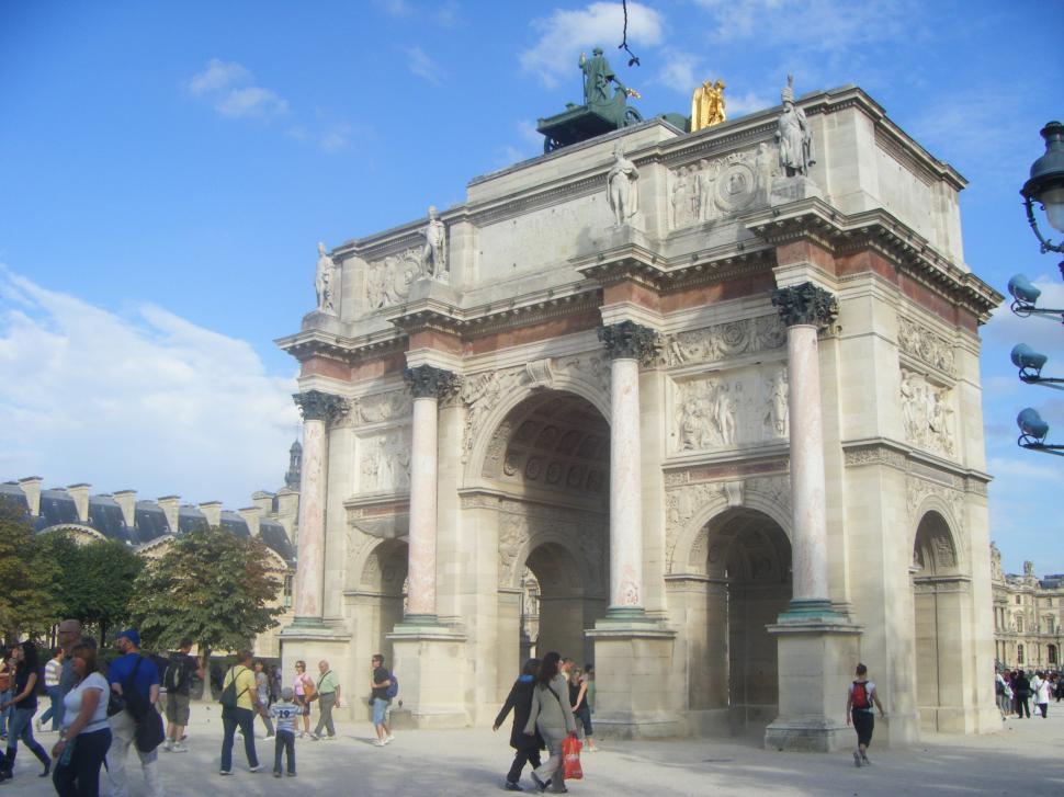 Free Image of Group of People Walking in Front of Building 