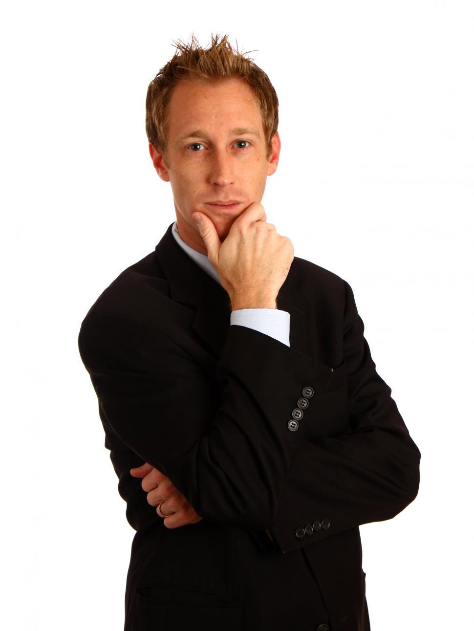 Free Image of A young businessman in a suit isolated on a white background 