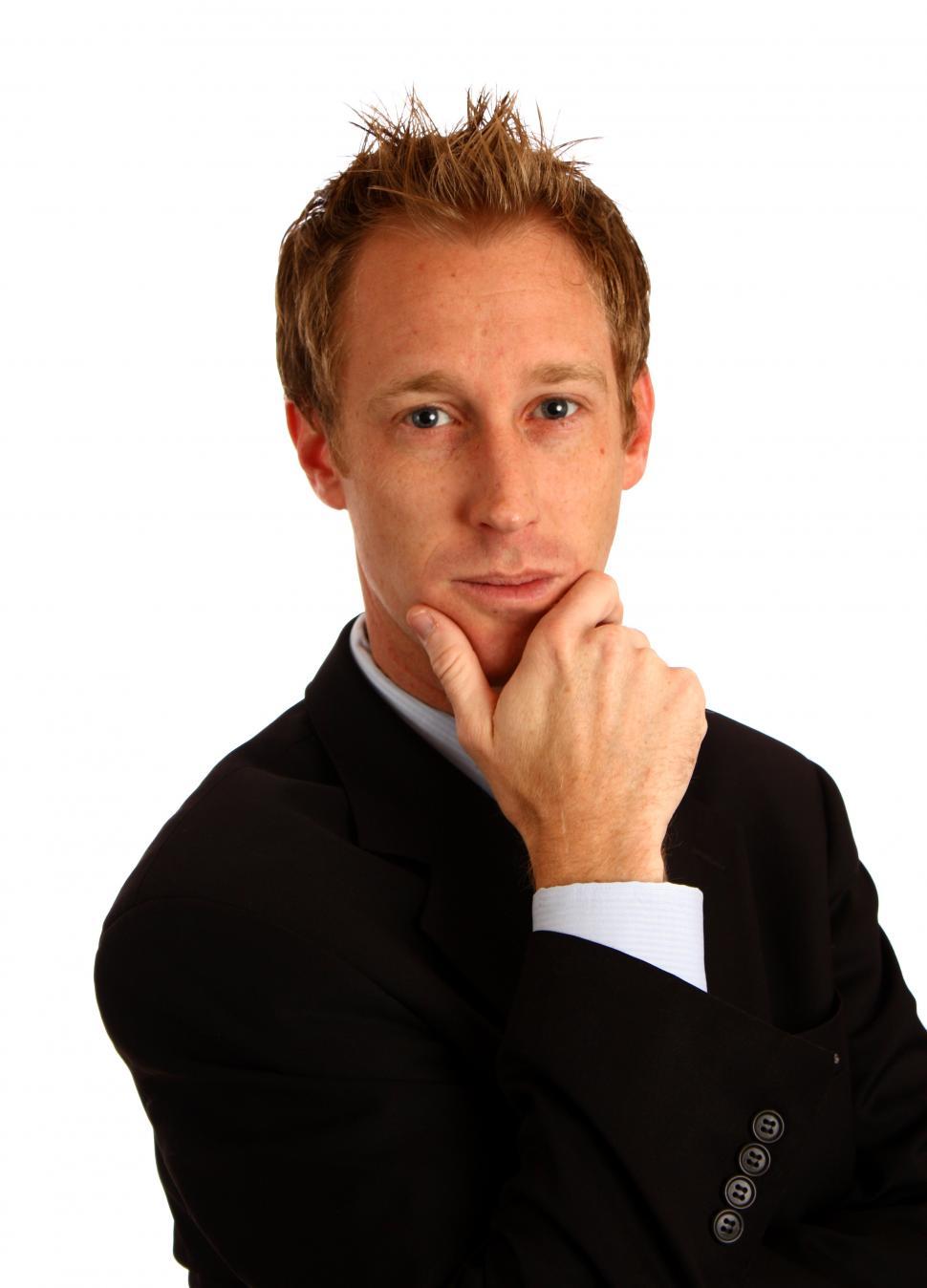 Free Image of A young businessman in a suit isolated on a white background 