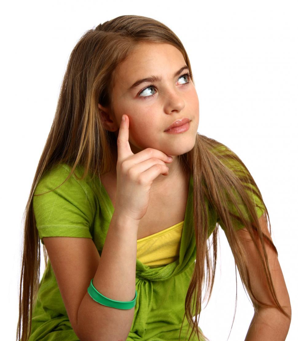 Free Stock Photo of A beautiful young girl with a thoughtful