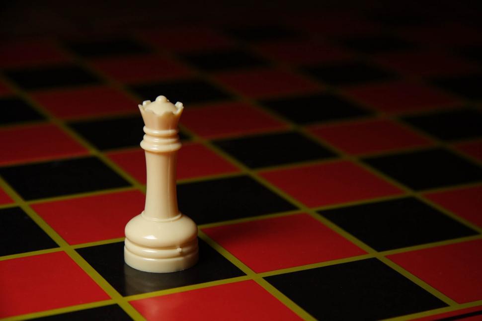 Red Queen Chess Standing Against Black Background Stock Photo