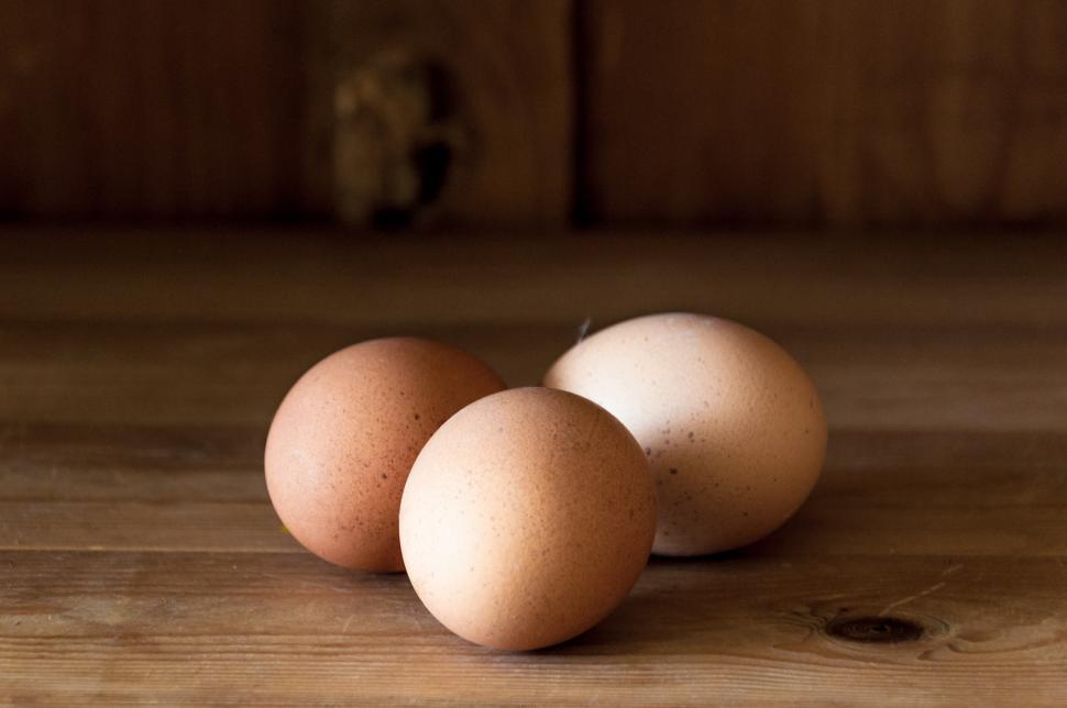 Free Image of Eggs on wood background 