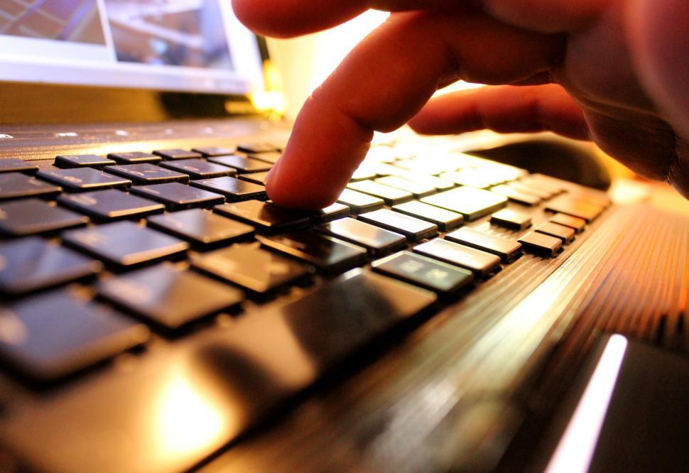 hands-typing-on-laptop-keyboard.jpg