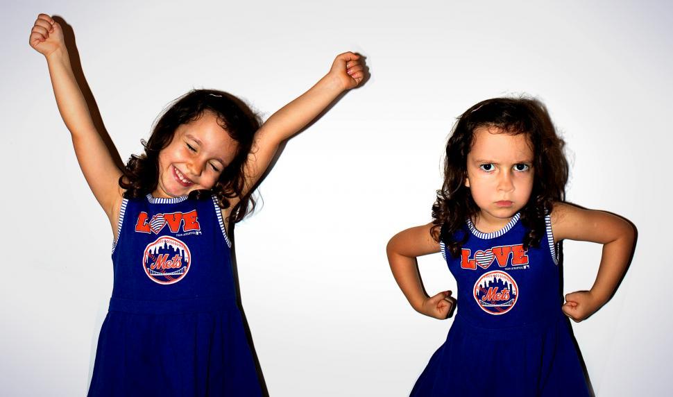 Free Stock Photo of Twin girls with opposite emotions Download Free