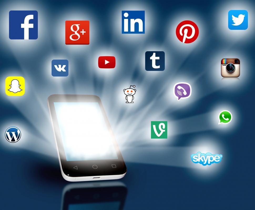 Social media networks projecting out from smartphone. Editorial