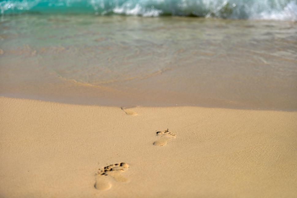 Free Image of Beach, wave and footprints  