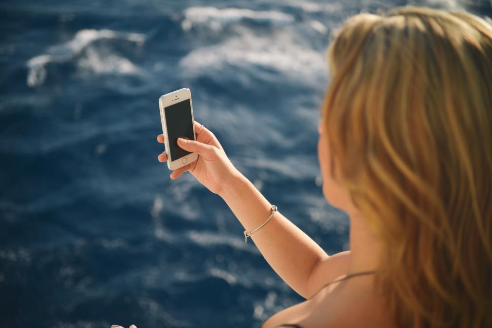 Free Image of Shooting a photo with phone 