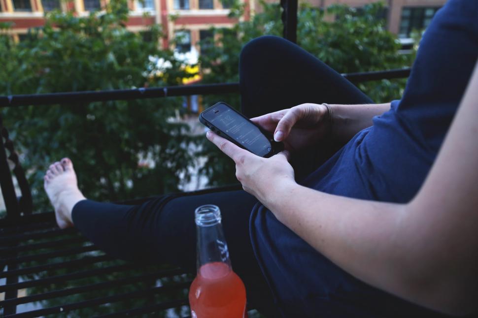 Free Image of Using a smartphone 