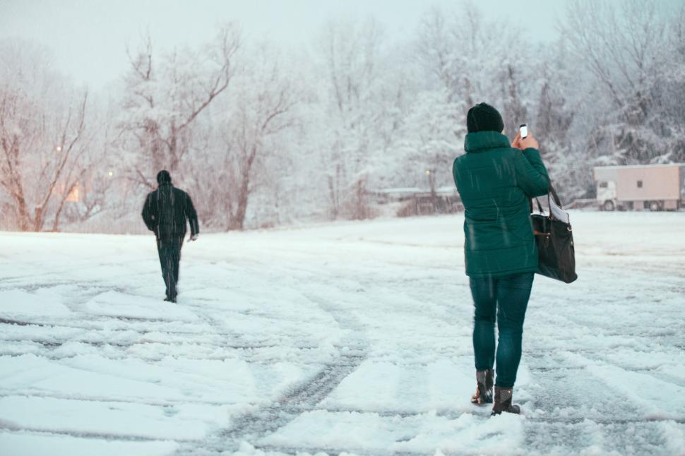 Free Image of Taking photo on a snowy day 