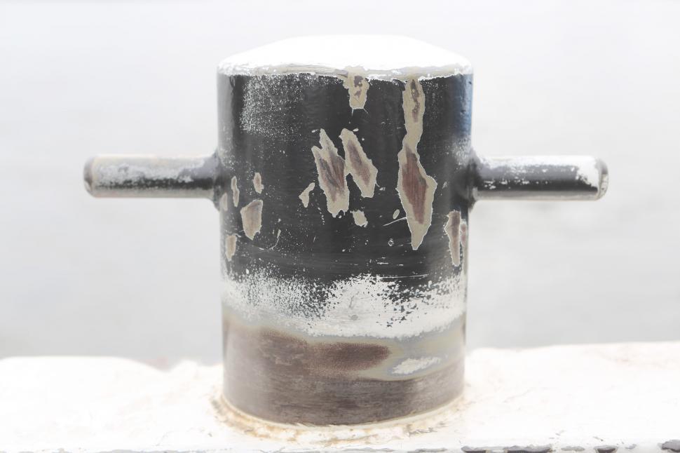 Free Image of Close Up of Metal Object on White Surface 