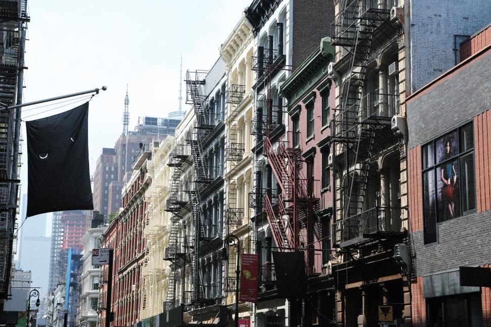 Free Image of City Street Filled With Tall Buildings 