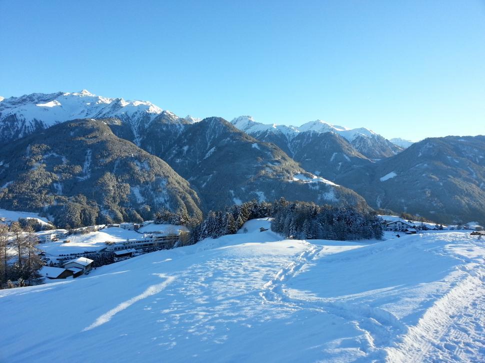 Free Image of Snowy mountains above lodge 