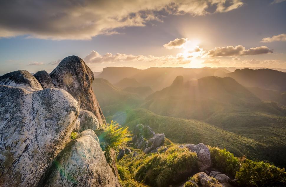 Free Image of Sun Setting Over Mountain Range 