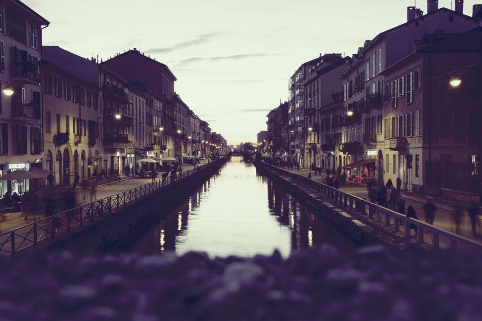 Free Image of River Running Through City Next to Tall Buildings 