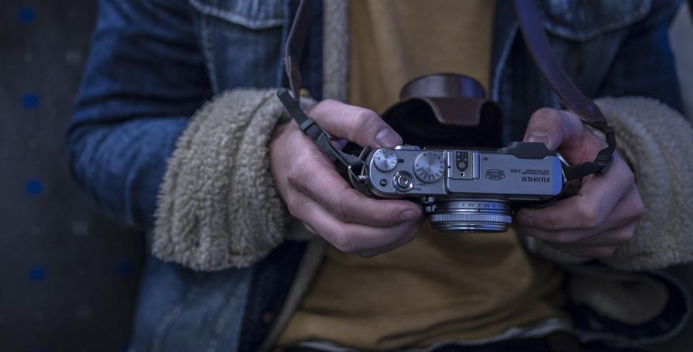 Free Image of Person Holding a Camera 