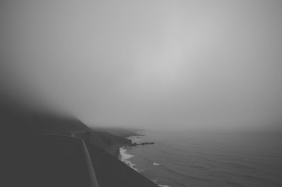 Free Image of Foggy Ocean Waves Breaking 