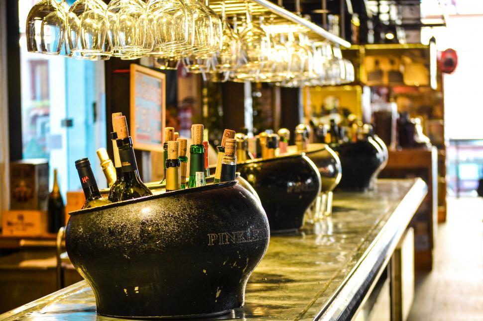 Free Image of Row of Wine Glasses on Bar Counter 
