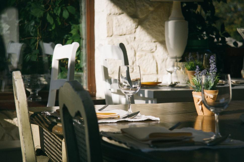 Free Image of Elegant Dining Room Table Set With Place Settings 