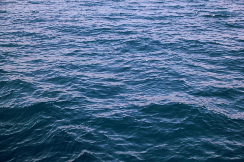 Free Image of Boat Sailing on Vast Water 