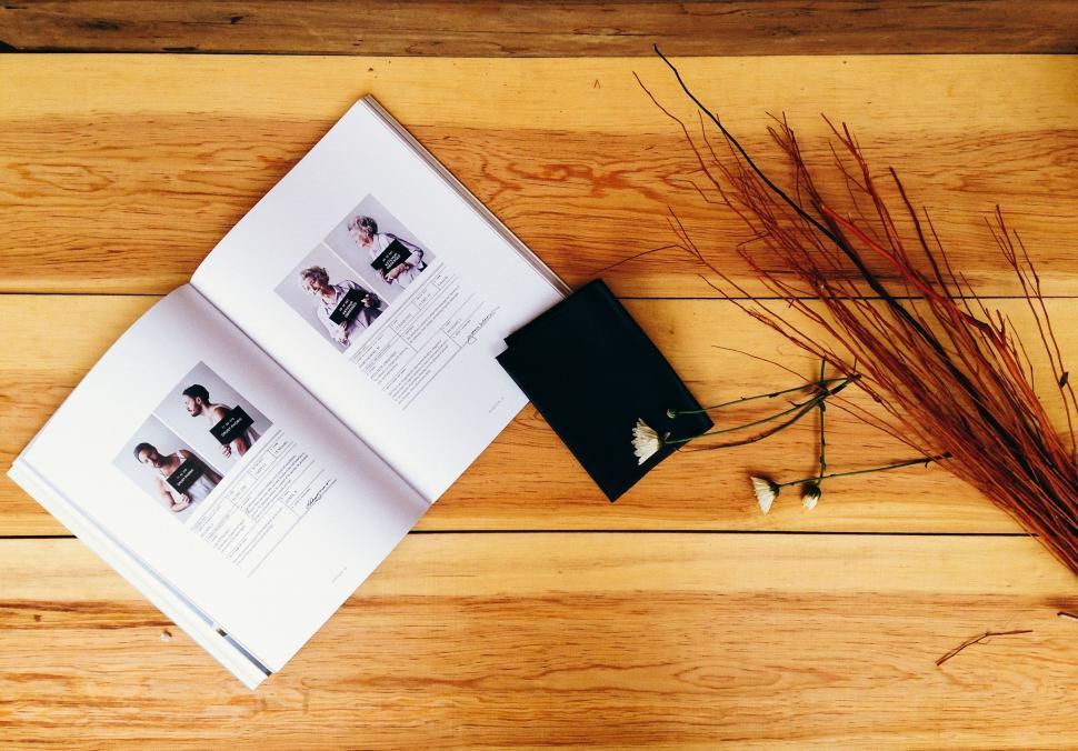 Free Image of Open Book on Wooden Table 