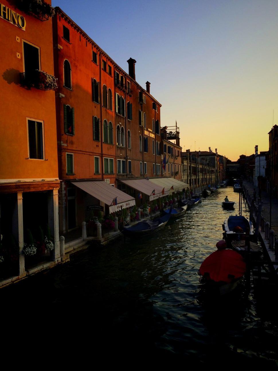 Free Image of Boat-Filled Canal in Urban Setting 